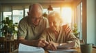 Senior couple reviewing their individual retirement account definition and IRA options for 2026 retirement planning