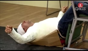 Injured Man Falls Off Chair