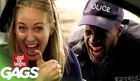 Woman Sprays Cop in the Face with Water Gun