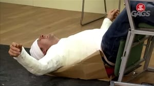 Injured Man Falls Off Chair