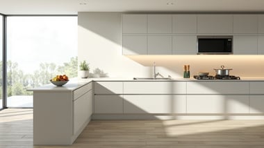 modern kitchen renovation with white cabinets and quartz countertops, bright natural lighting