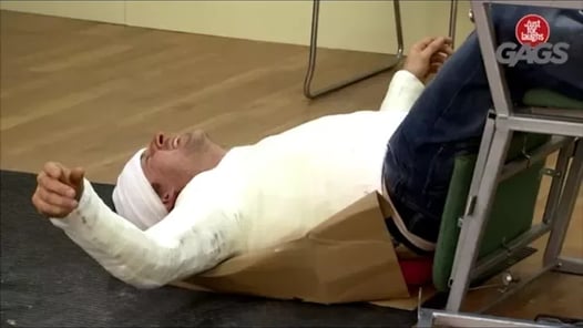 Injured Man Falls Off Chair